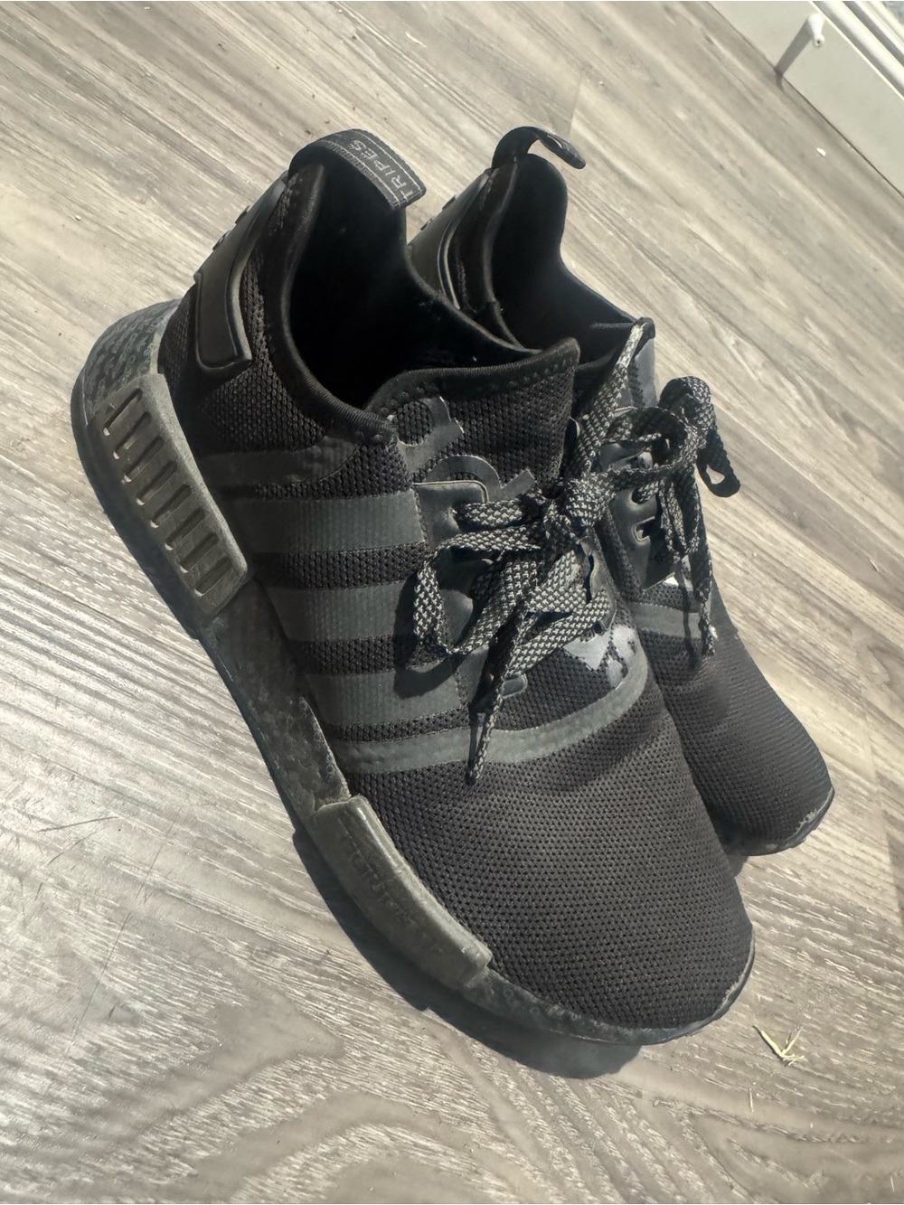 adidas men’s size 9 NMD_R1 in triple black